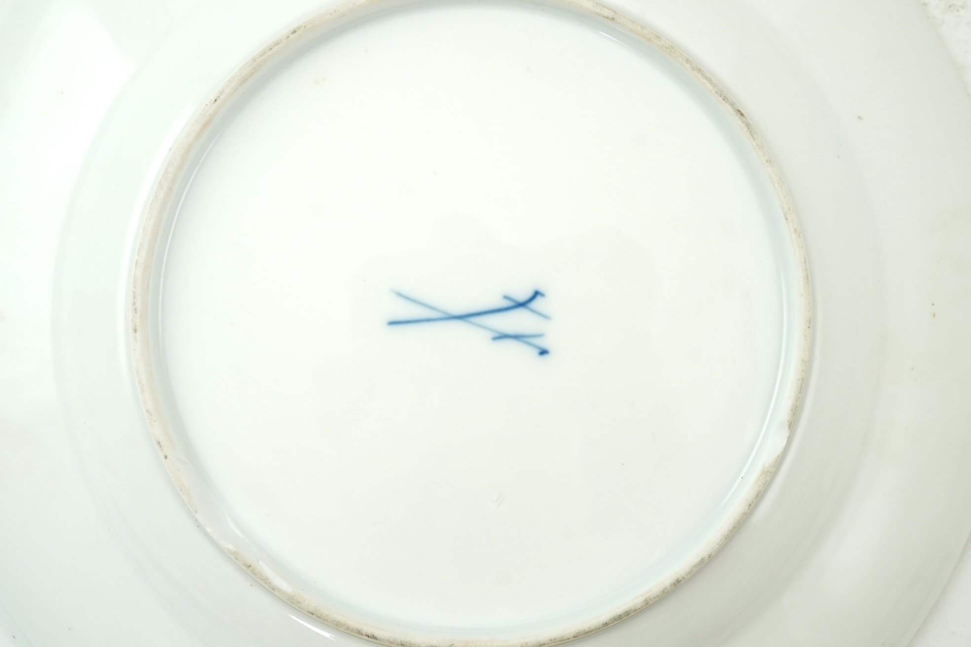 A set of six Meissen plates, decorated in the Capodimonte style, late 19th century